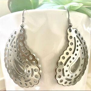 Silver tone paisley statement earrings